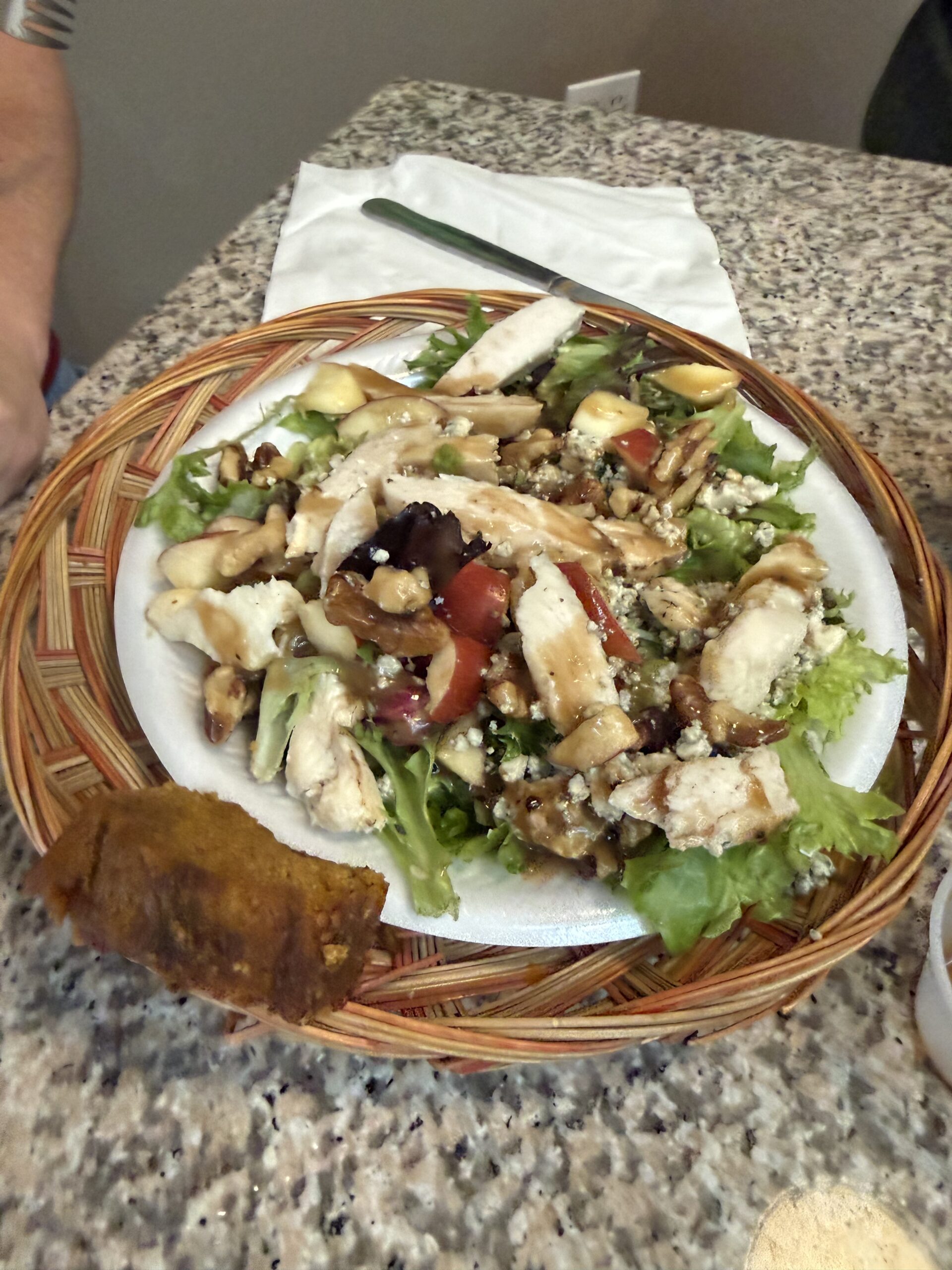 California Waldorf chicken salad served with a slice of pumpkin bread