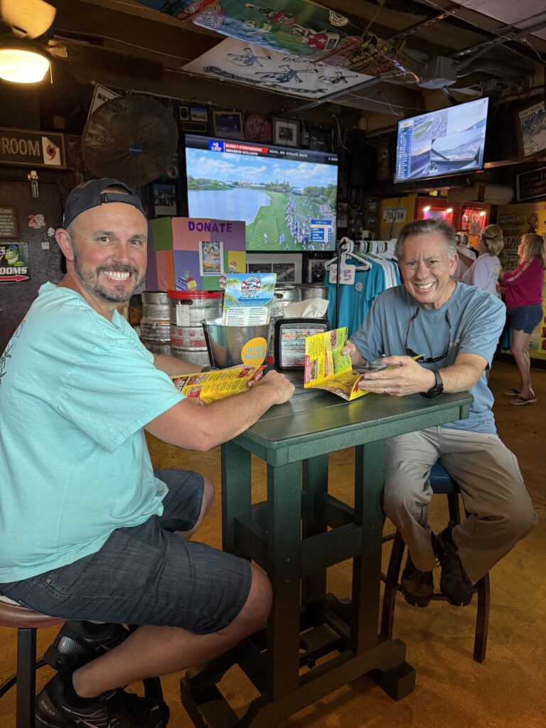 Guests gathered inside Sandbar Sports Grill in Cocoa Beach