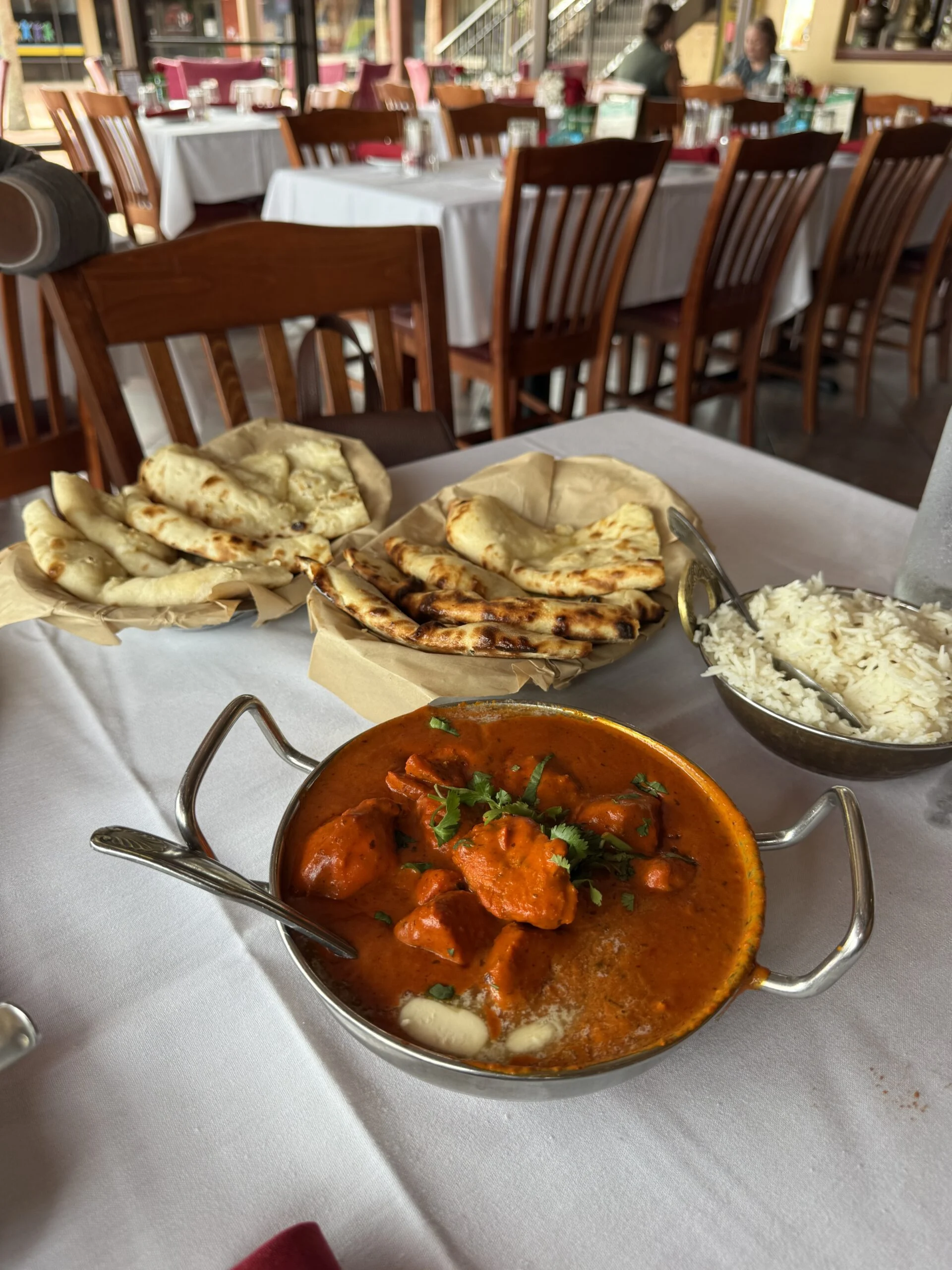 Butter chicken with naan and rice at Guru’s Indian Restaurant in Clermont