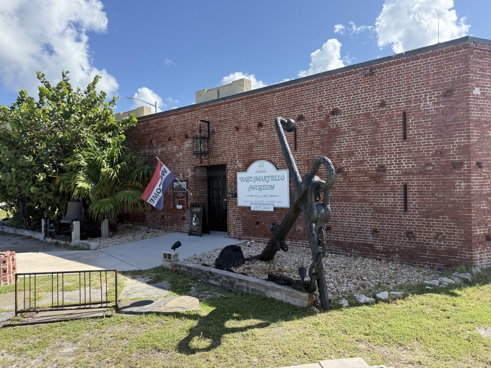 Brick museum building with a large anchor outside at East Martello in Key West.